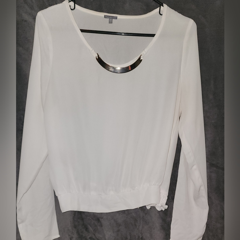 White long sleeve blouse with necklace accessory